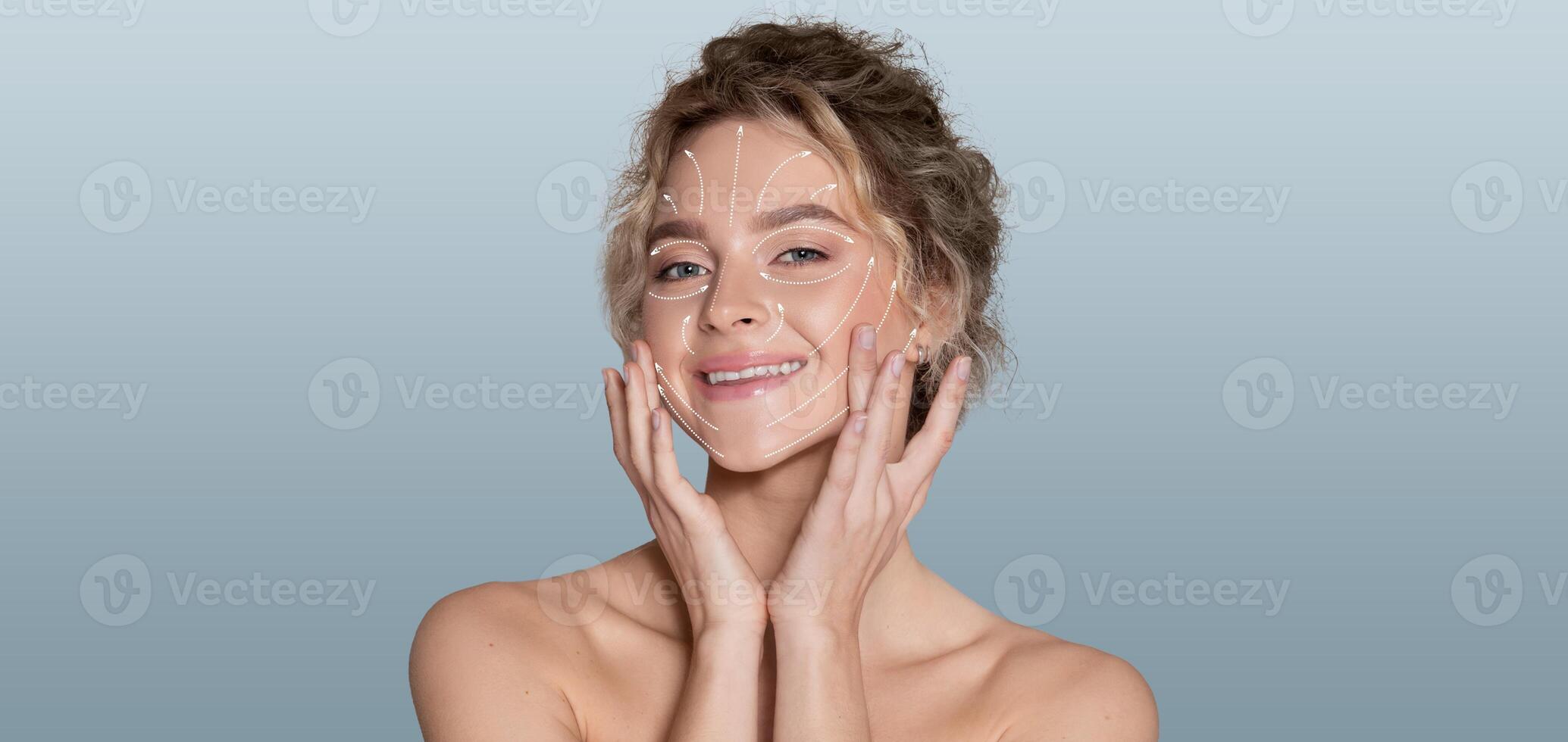 A woman enjoys her pampering skin care routine, gently applying products to her face with a calm expression. The isolated background emphasizes relaxation and beauty tranquility. photo