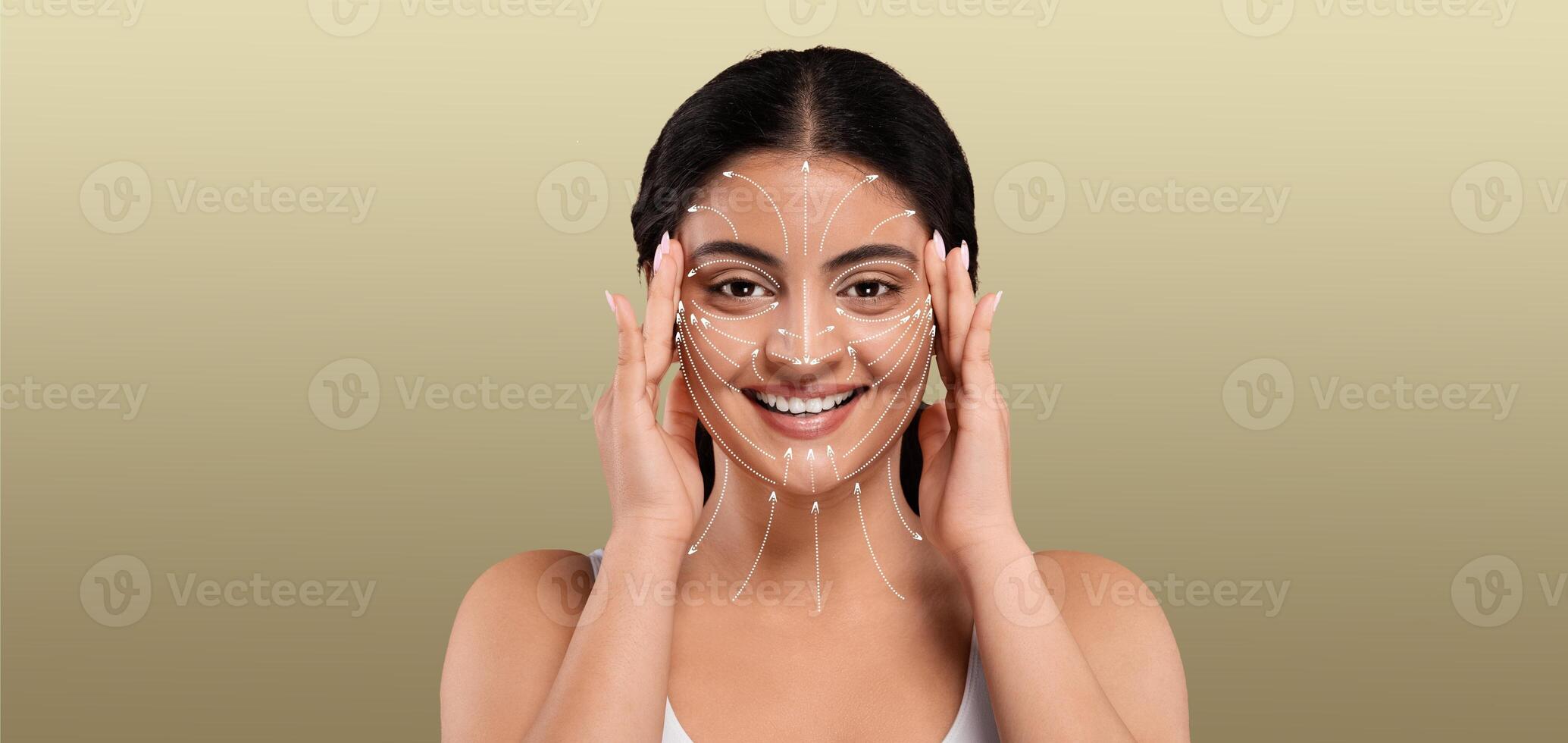 Indian woman enjoys her skin care routine, pampering herself with a facial treatment. She gently places her hands on her face, embracing relaxation in a serene, isolated setting. photo