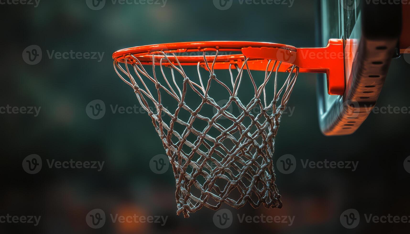 Basketball hoop is ready for players to practice shooting and scoring on a dusky evening photo