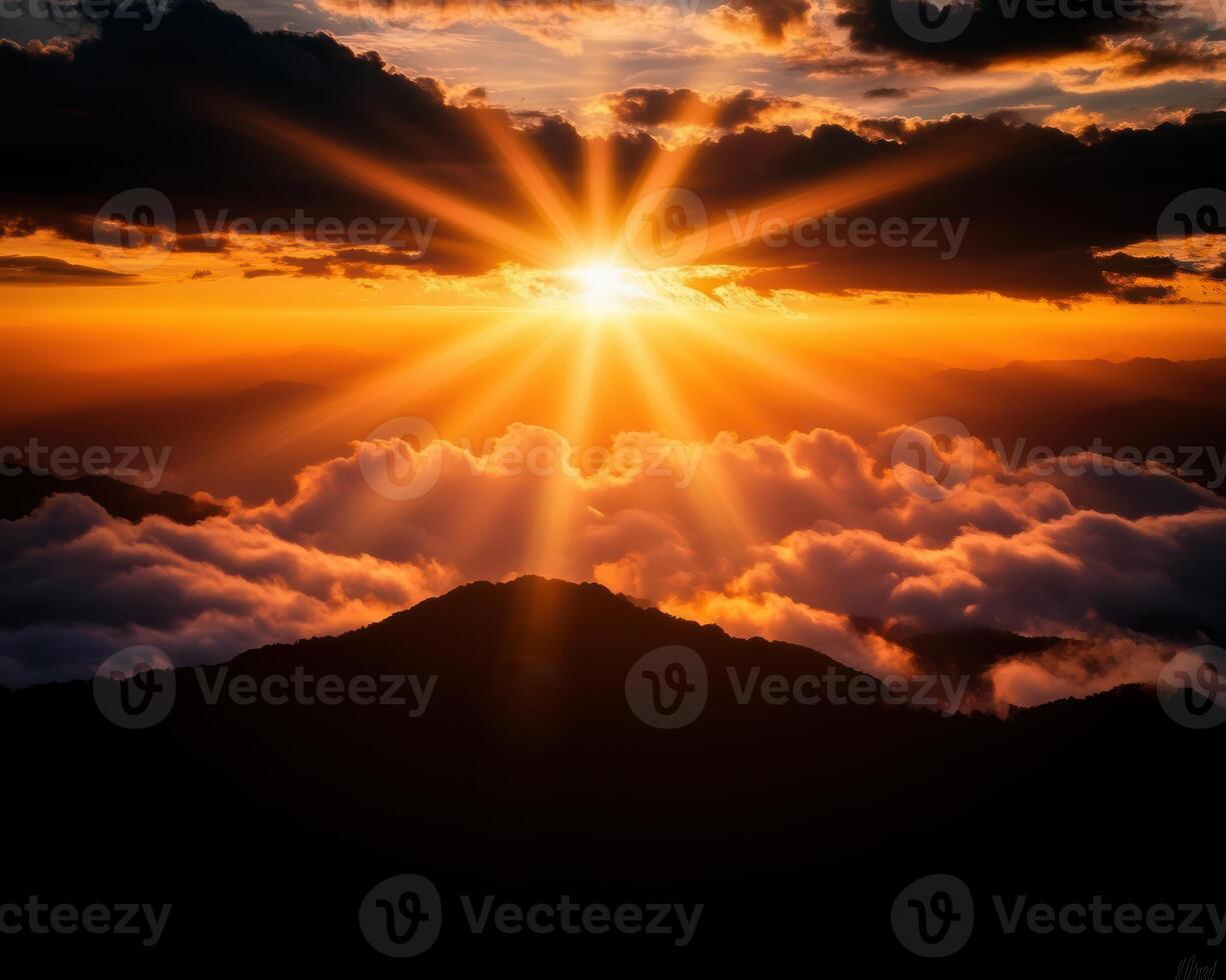 A sun is shining through the clouds on a mountain photo