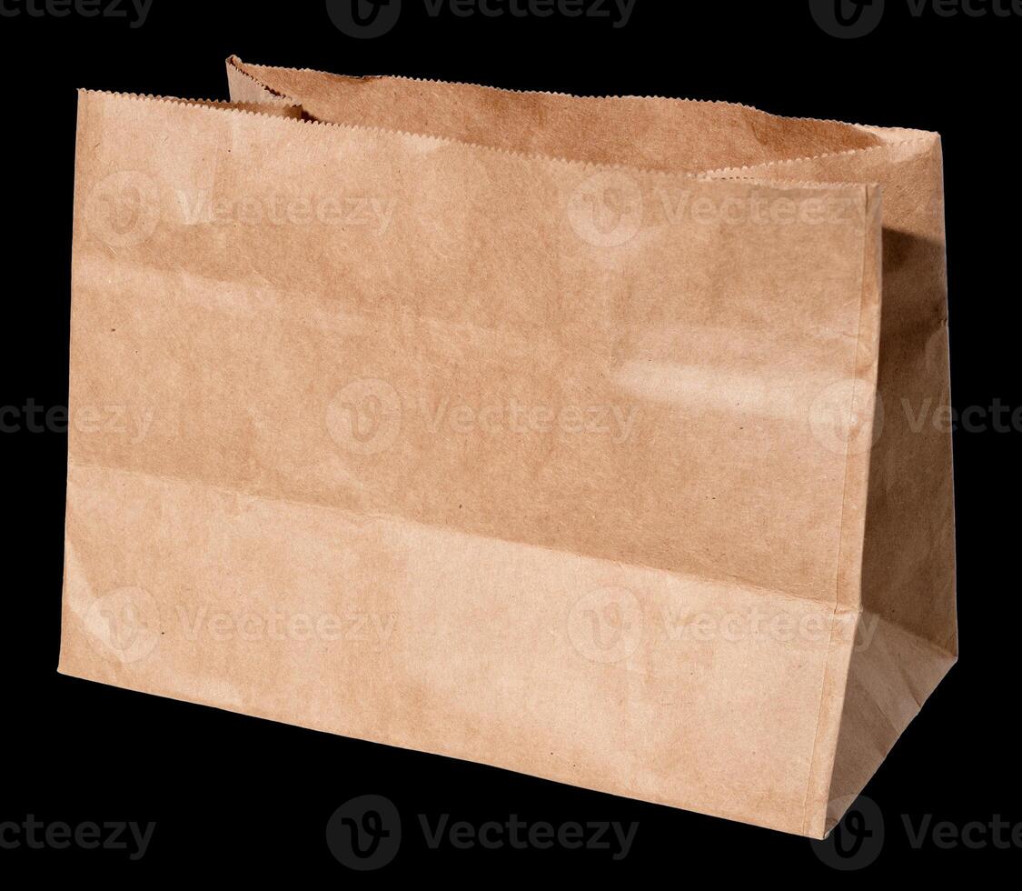 Blank Handleless paper bag for food isolated on black background. Template mockup photo