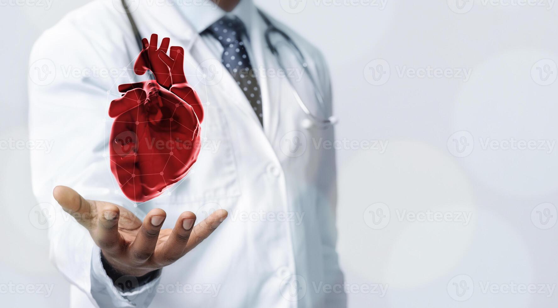 Healthcare Concept. Closeup of doctor in white coat holding virtual heart in open palm, copy space photo