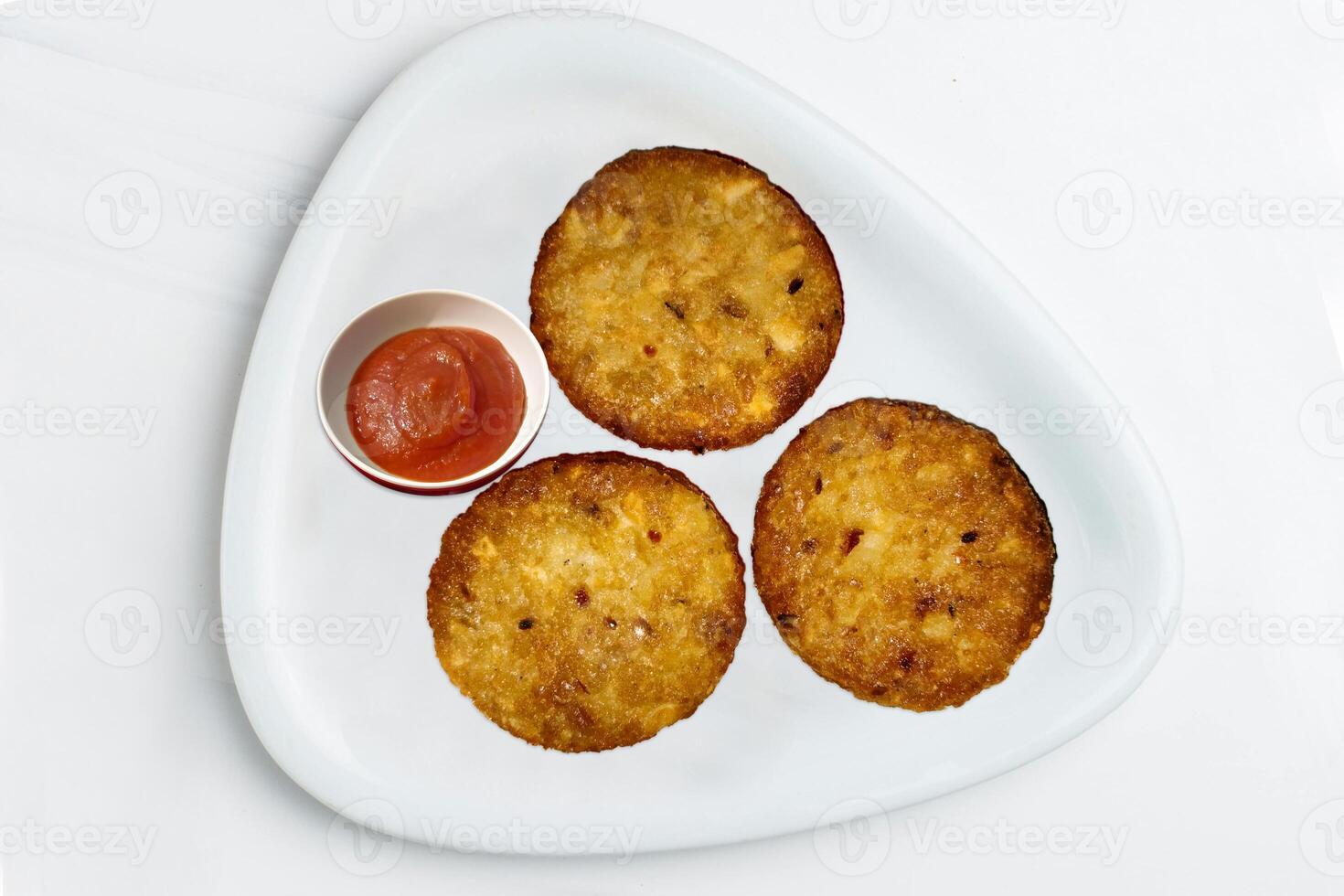 Frozen Aloo Tikki. Potato spice patties, Aloo Tikki ready to serve for evening snacks photo