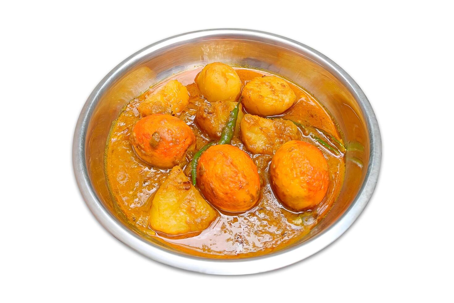 Egg curry with potato. Dim aloo dum is Indian Style Masala Egg Curry in a bowl on a white background photo