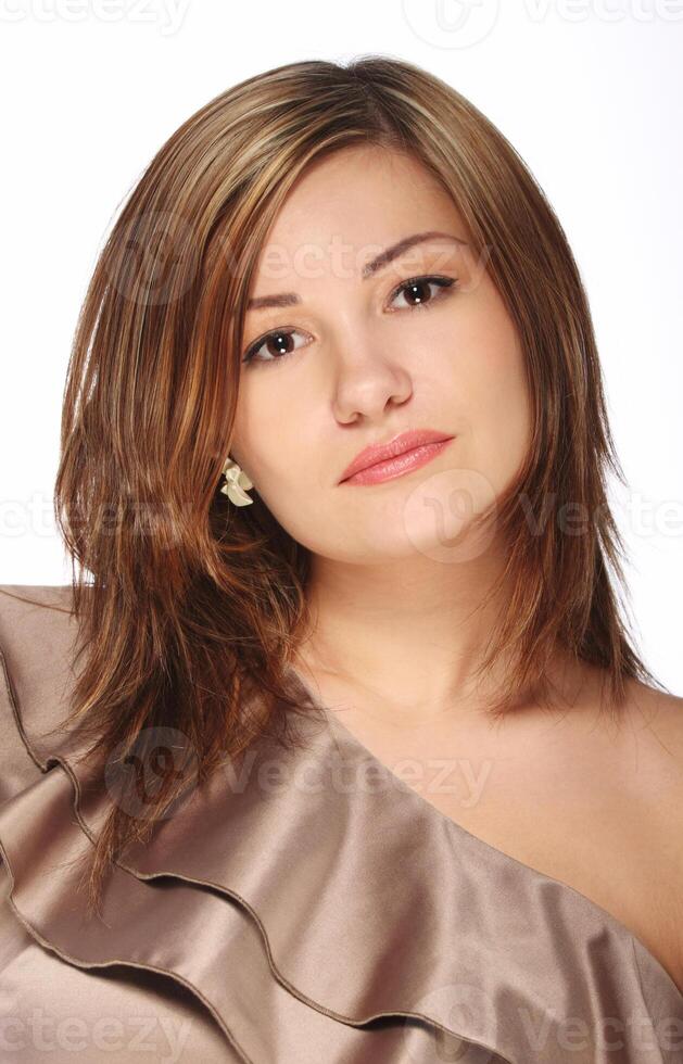 Beautiful girl in the beige dress photo