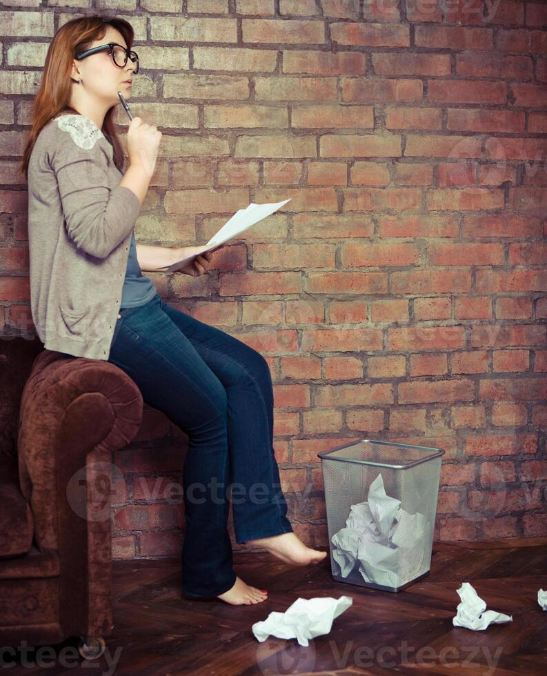 Young woman writer working photo