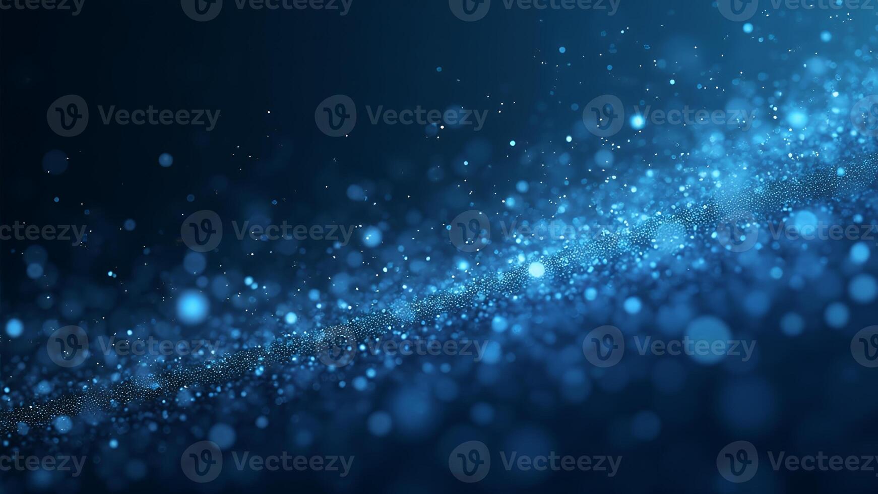 Dark blue and glow particles scattered across abstract background photo