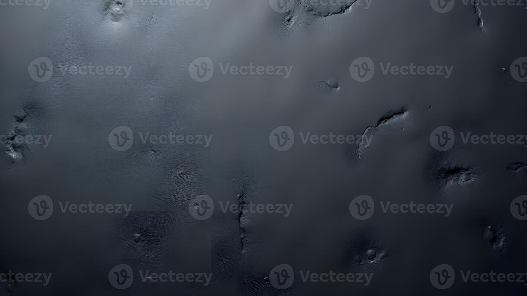 Dark grey textured wall background is ideal for abstract design projects. It provides a rich, neutral backdrop with a subtle texture for creative applications that are modern and minimalist photo