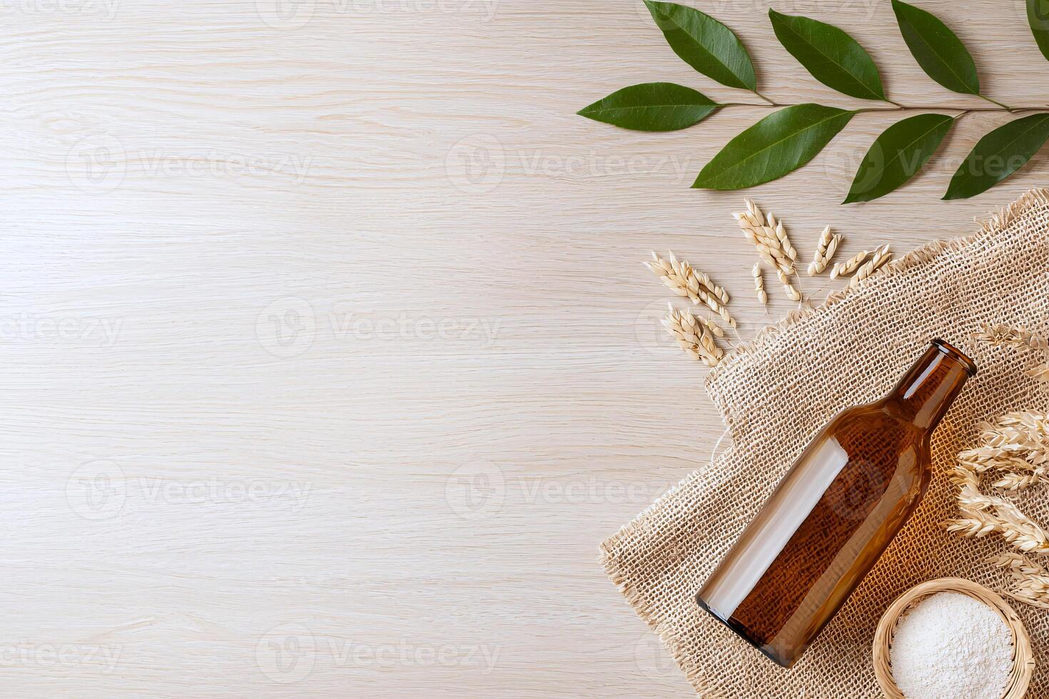 Wooden texture table with an artisan crafted bottle, perfect for sustainable and earthy mockup displays photo