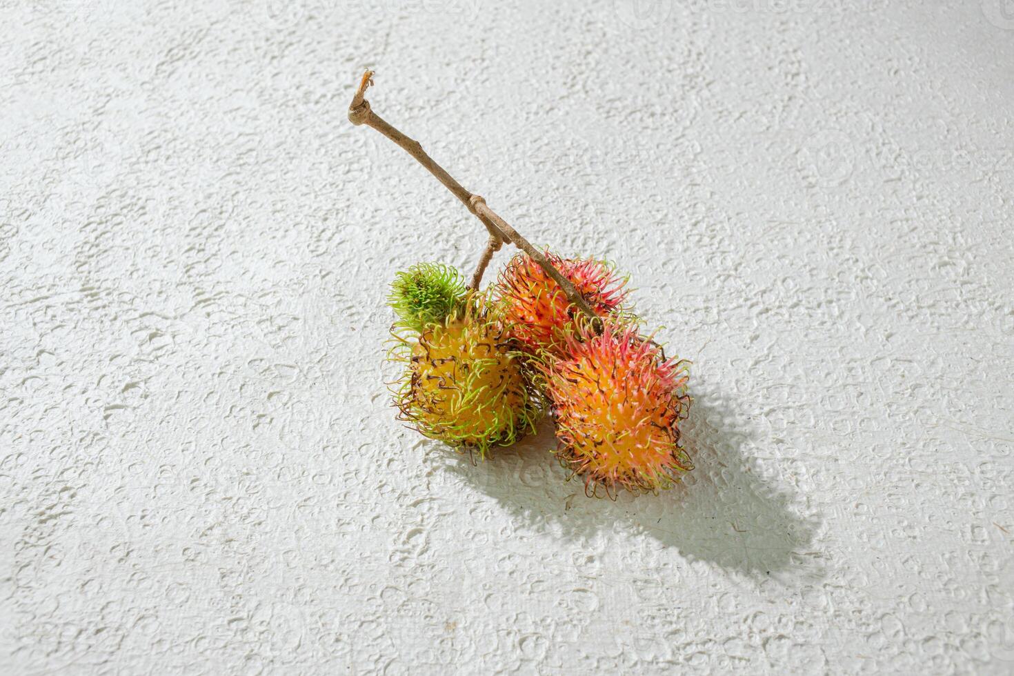 a bunch of rambutan fruit photo