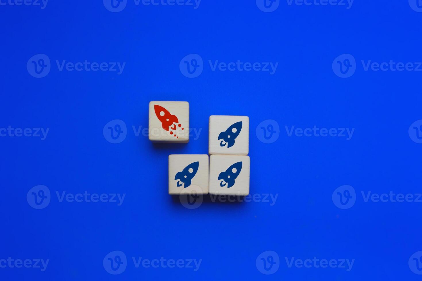 Leadership concepts and differences ,The red rocket goes to the opposite end of the group photo