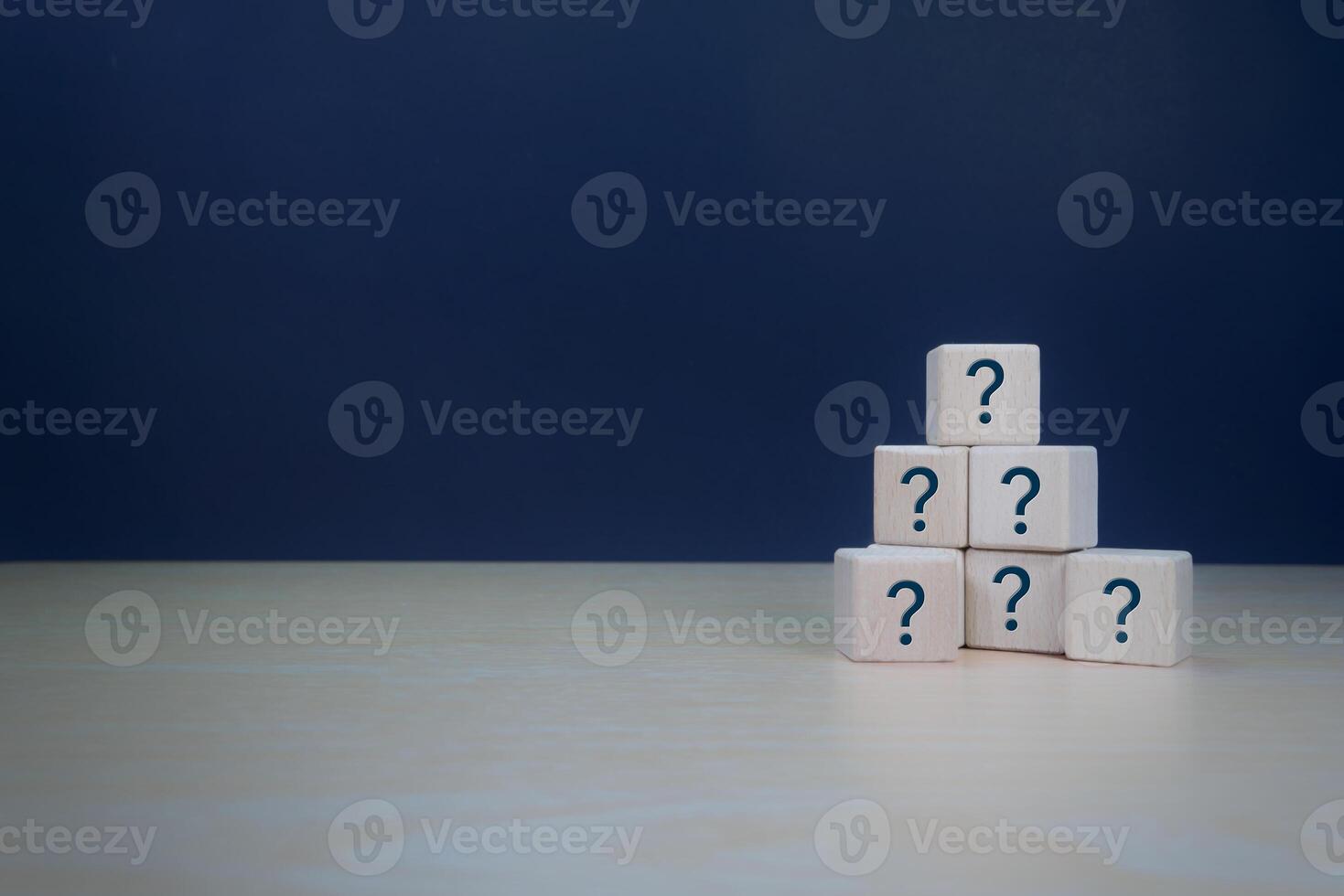 Question mark on wooden block with blank space photo
