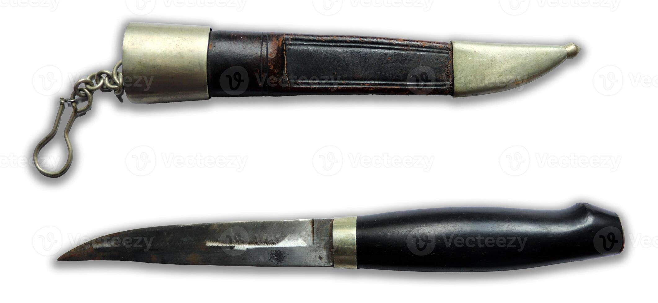 Unique antique dagger with ornate scabbard showcasing craftsmanship from a bygone era photo