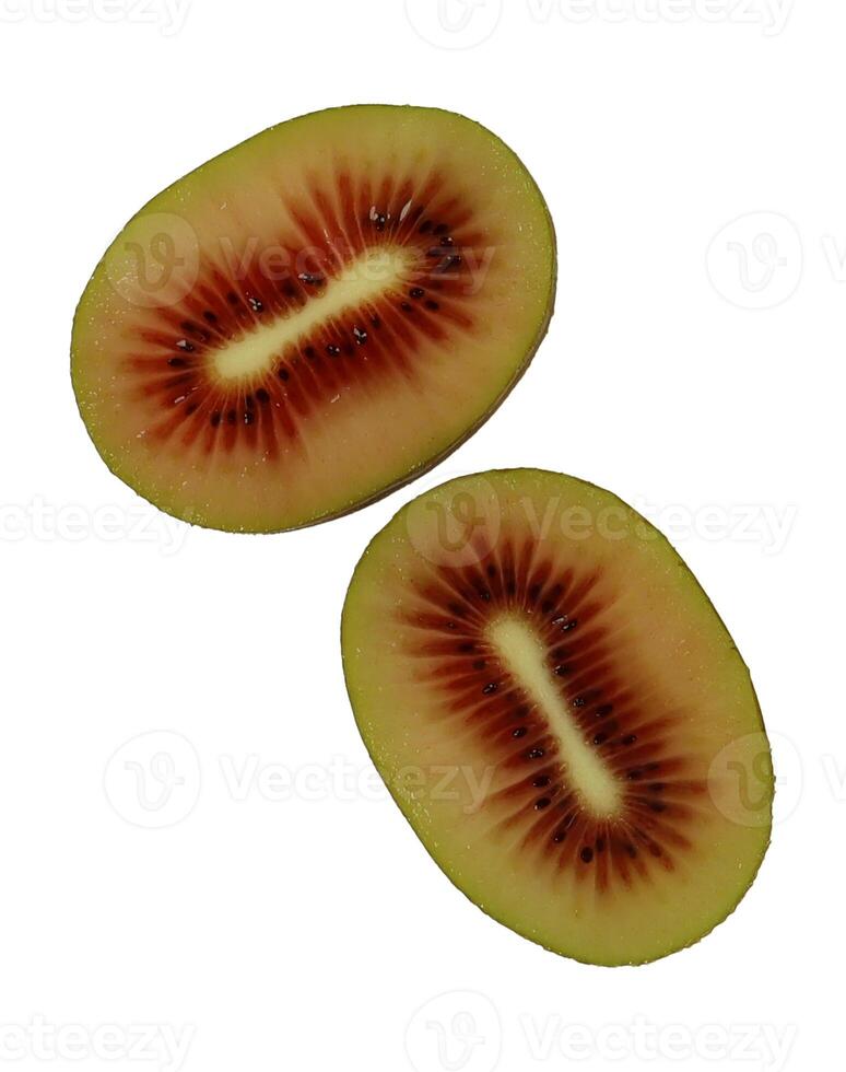 Red kiwi sliced in half, showcasing vibrant colors and unique patterns photo