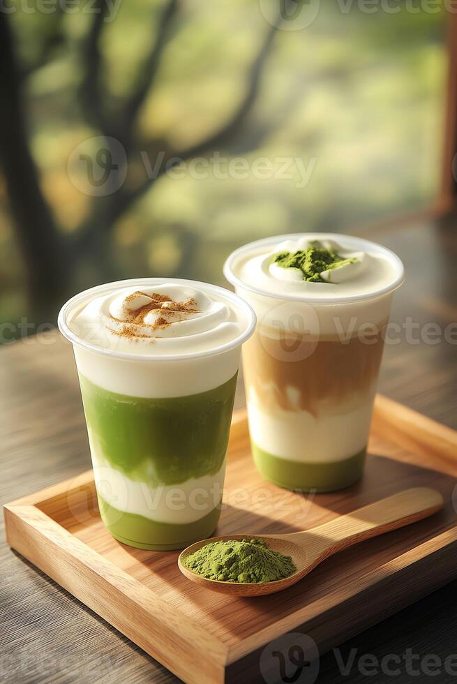 Delicious matcha and coffee drinks are served in transparent cups on a wooden tray in a cozy cafe setting. photo