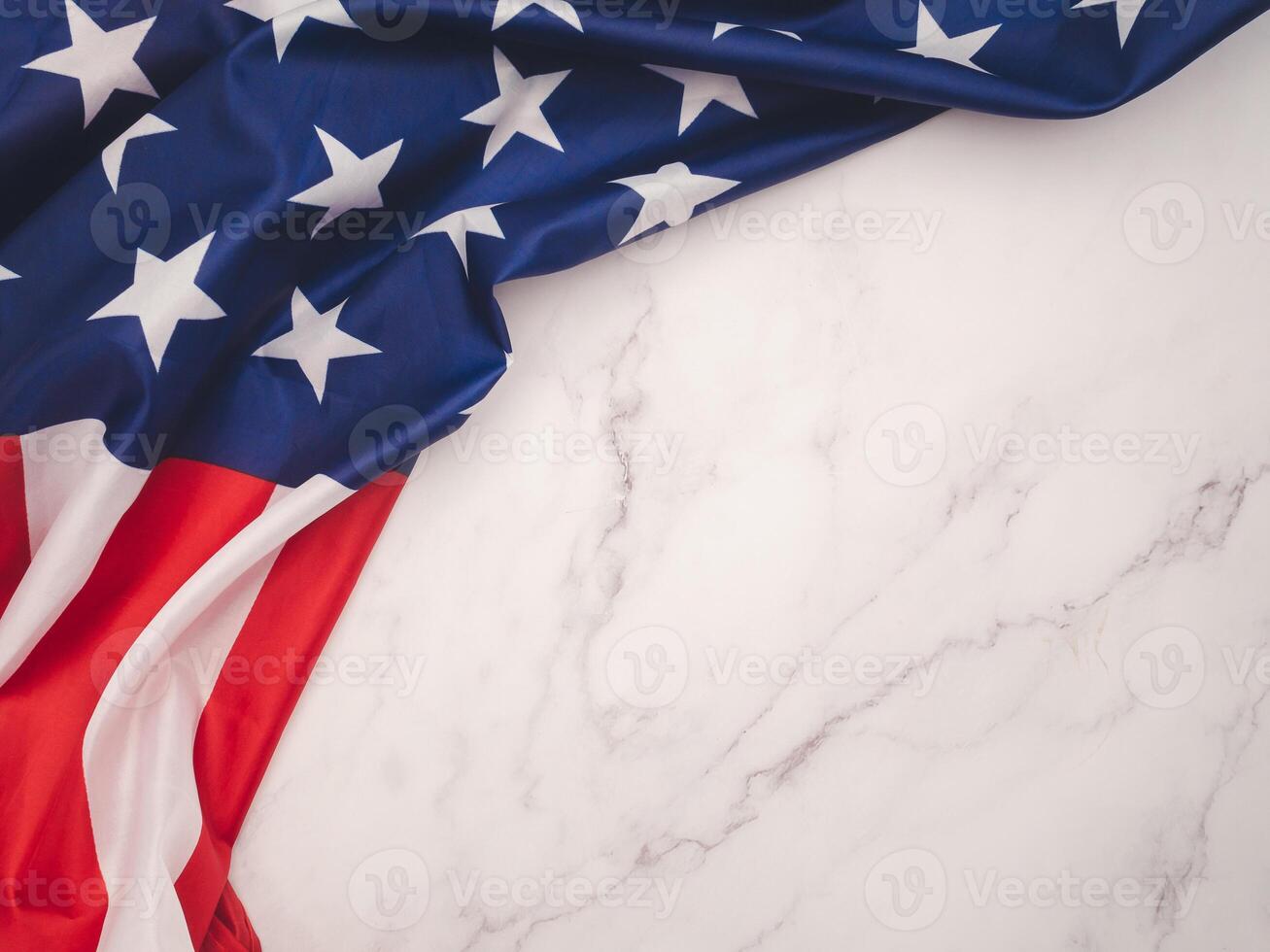 Top view of the American flag on a marble table with copy space for text photo