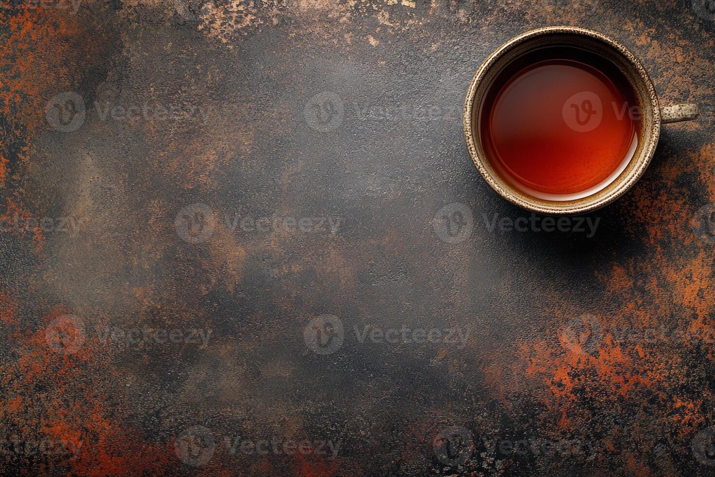 A rustic cup of tea on a textured background, evoking warmth and relaxation. photo