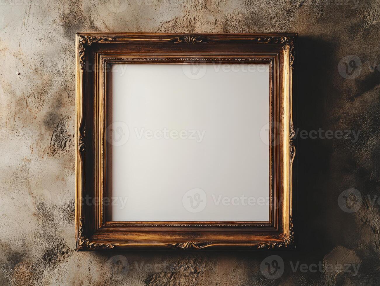 An empty ornate picture frame against a textured wall, inviting creativity or decoration. photo
