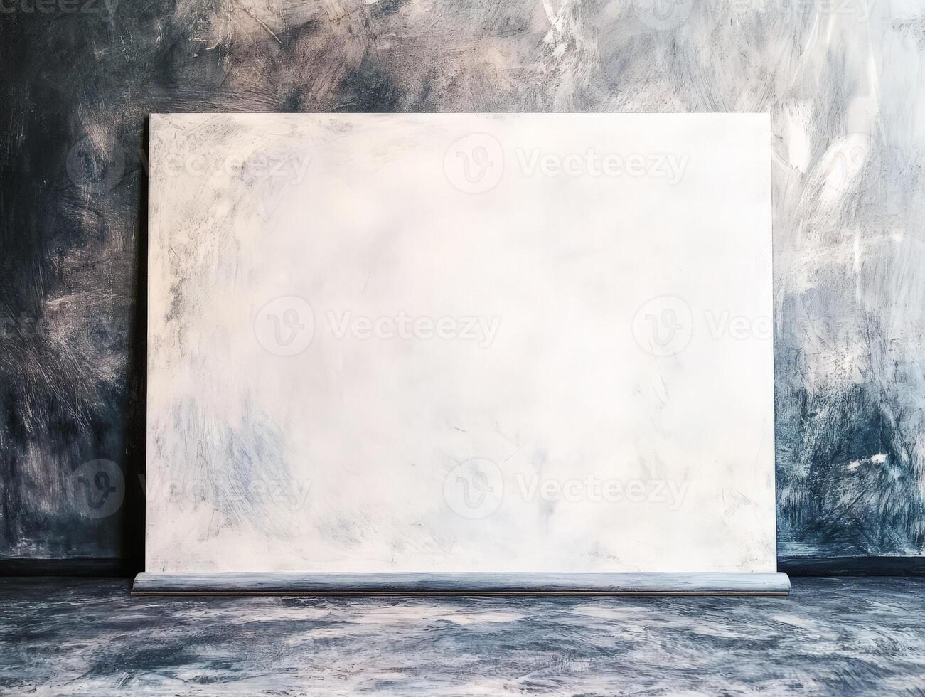 A blank canvas against a textured wall, inviting creativity and artistic expression. photo