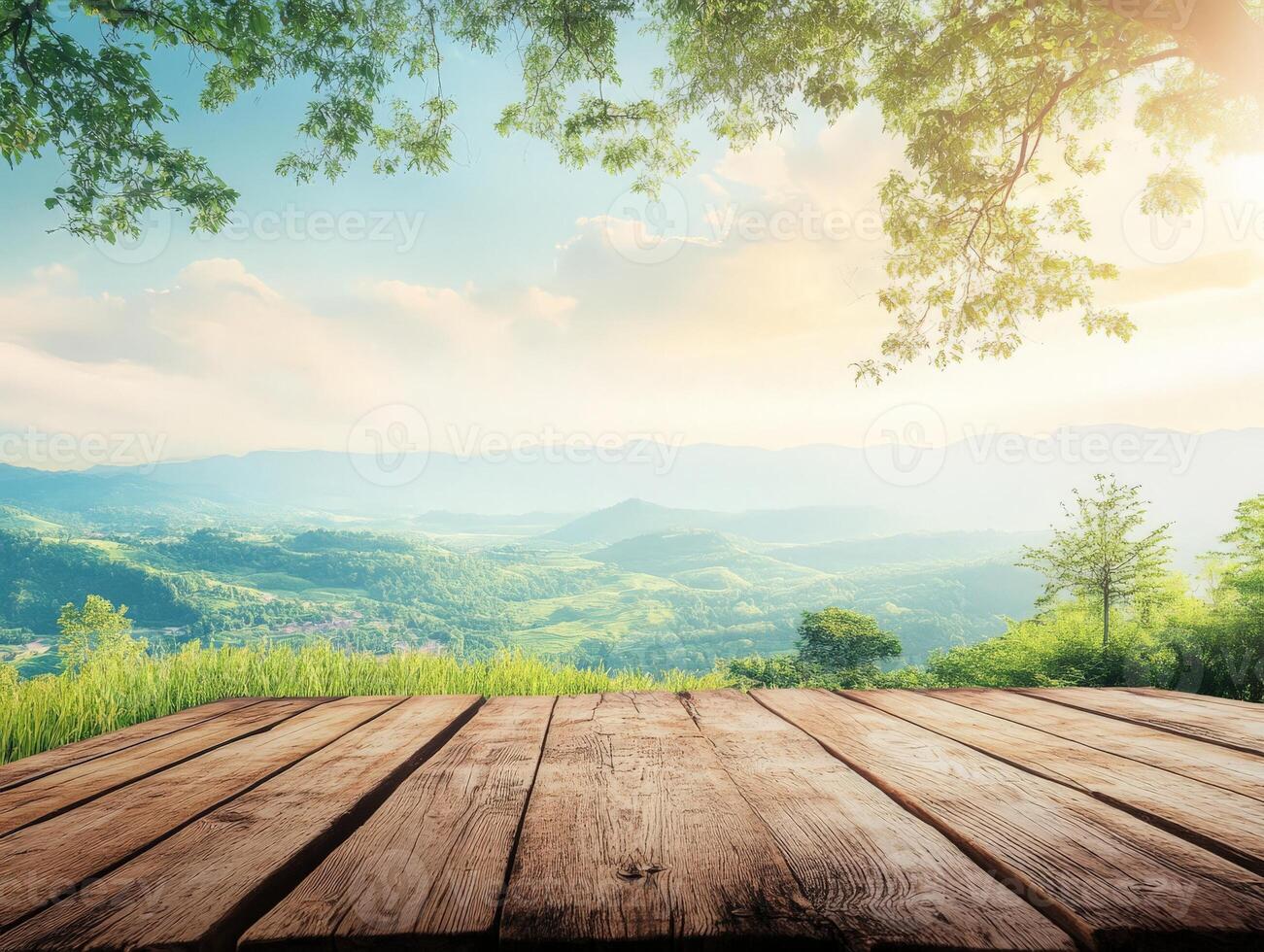 Scenic landscape with a wooden platform overlooking rolling hills and a bright sky. photo
