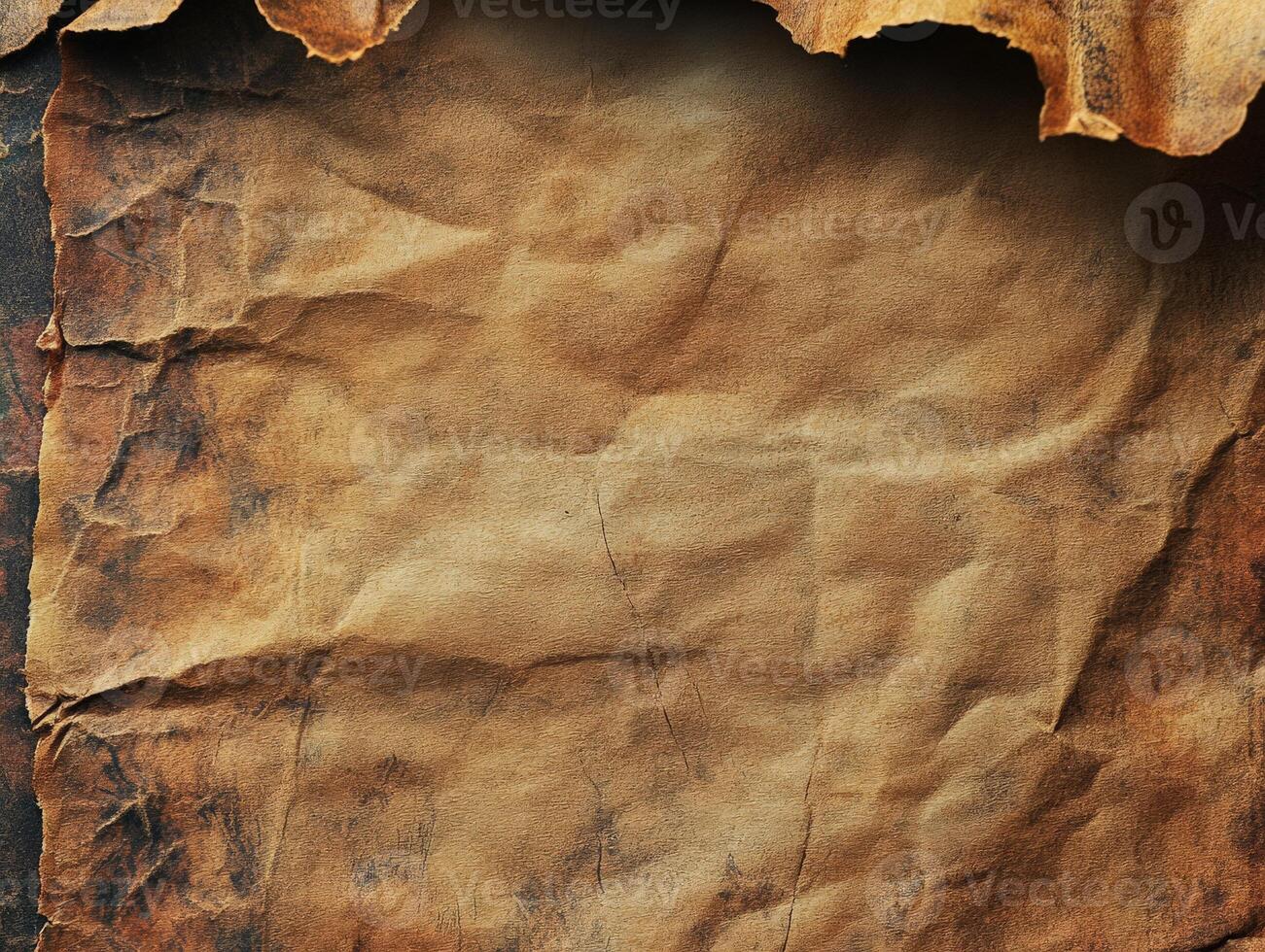 A crumpled, aged piece of parchment with a textured surface, evoking a sense of history. photo