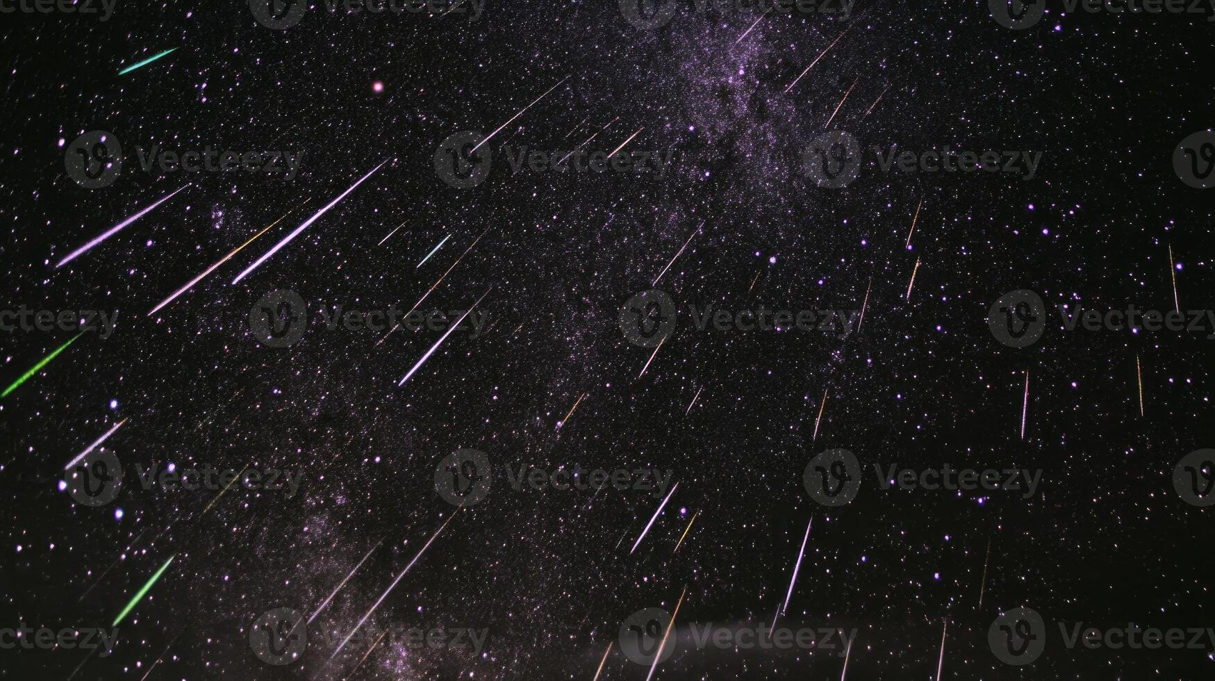 Streaks of shooting stars illuminate the night sky during a meteor shower in a remote mountainous location photo