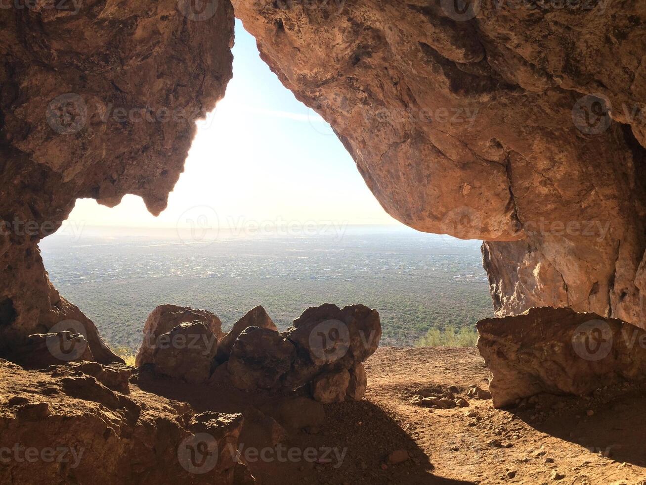Looking out at the Phoenix Valley from Broadway Cave, Apache Junction, Arizona photo