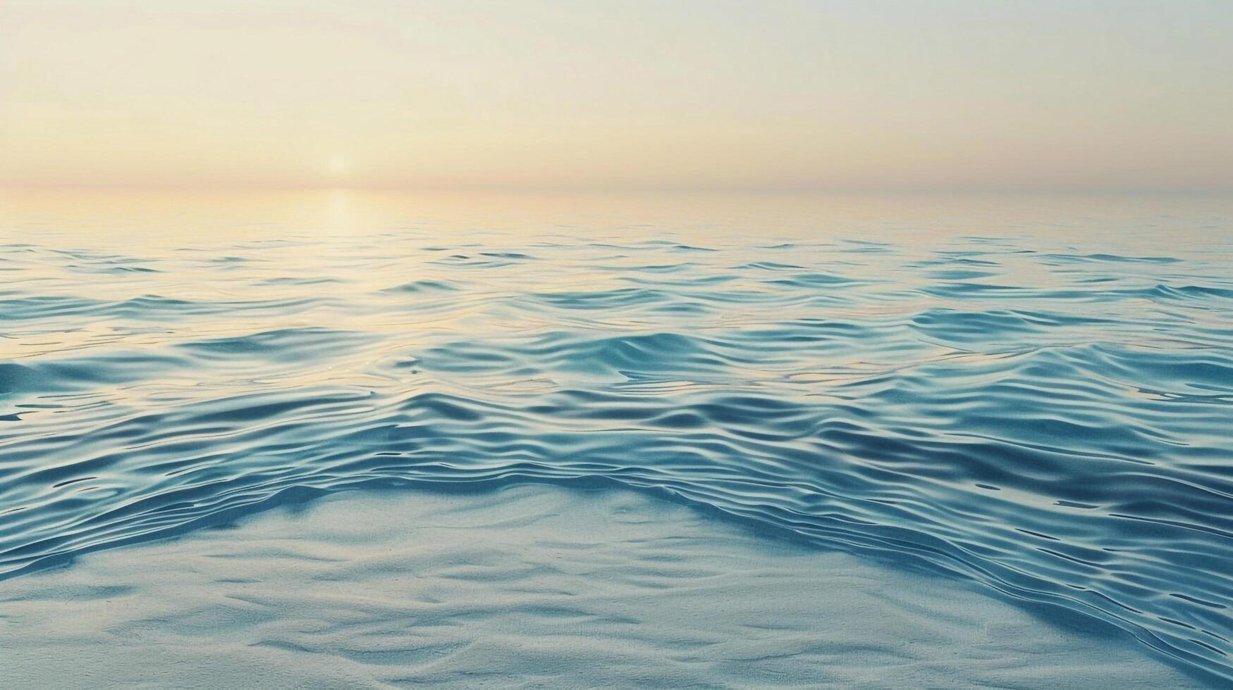 A large ocean with waves and sun setting photo