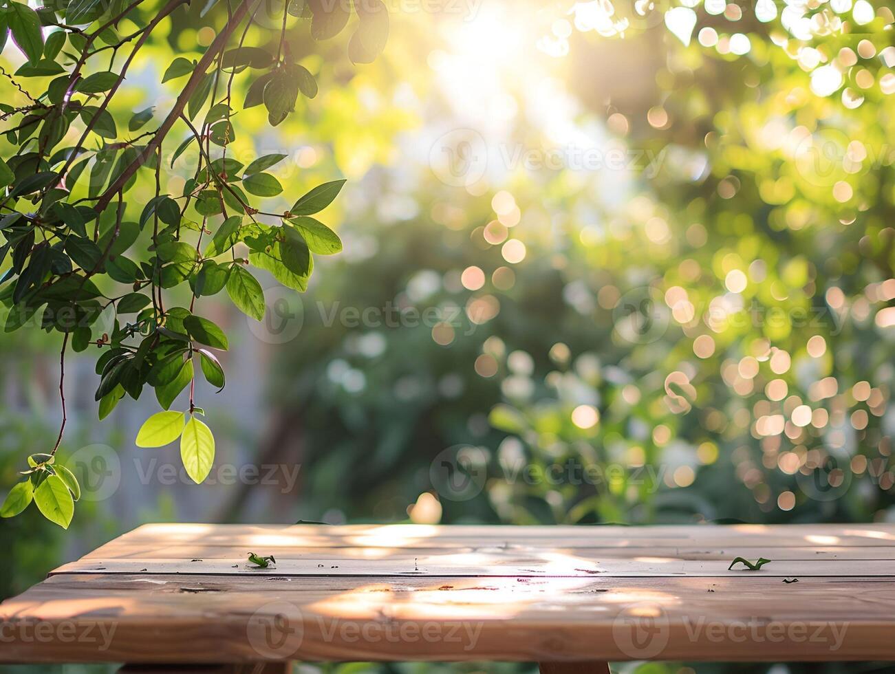 A wooden table with leaves in the background photo