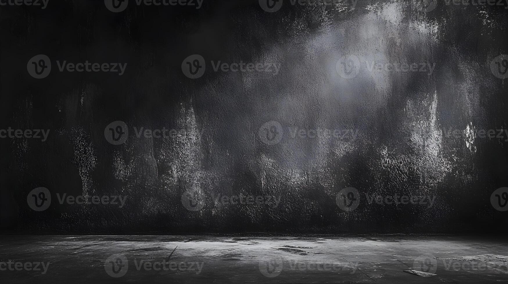 An empty room with a dark wall and floor photo