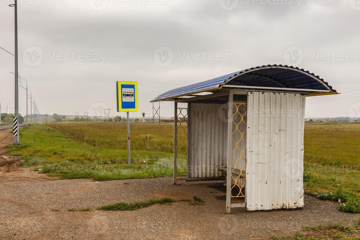 empty bus stop on road. photo