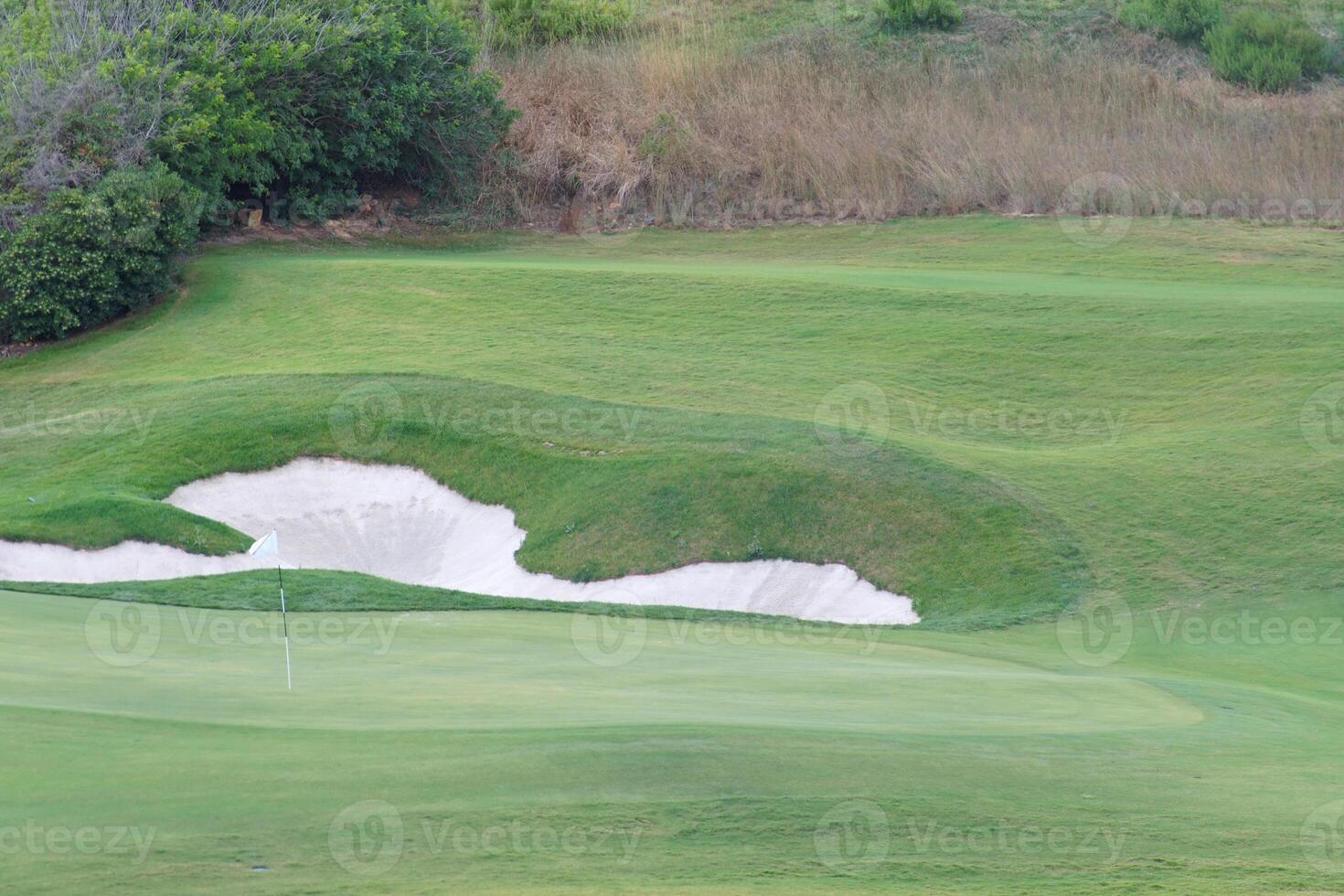 Conceptual golf photo with a green put