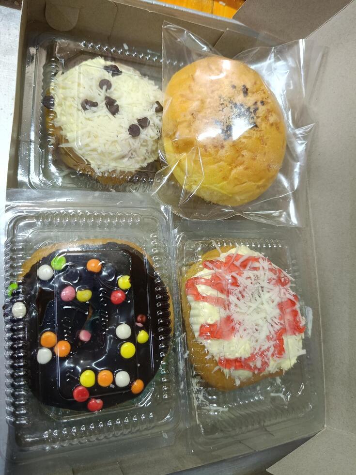 Sweet and savory snacks in the paper box photo