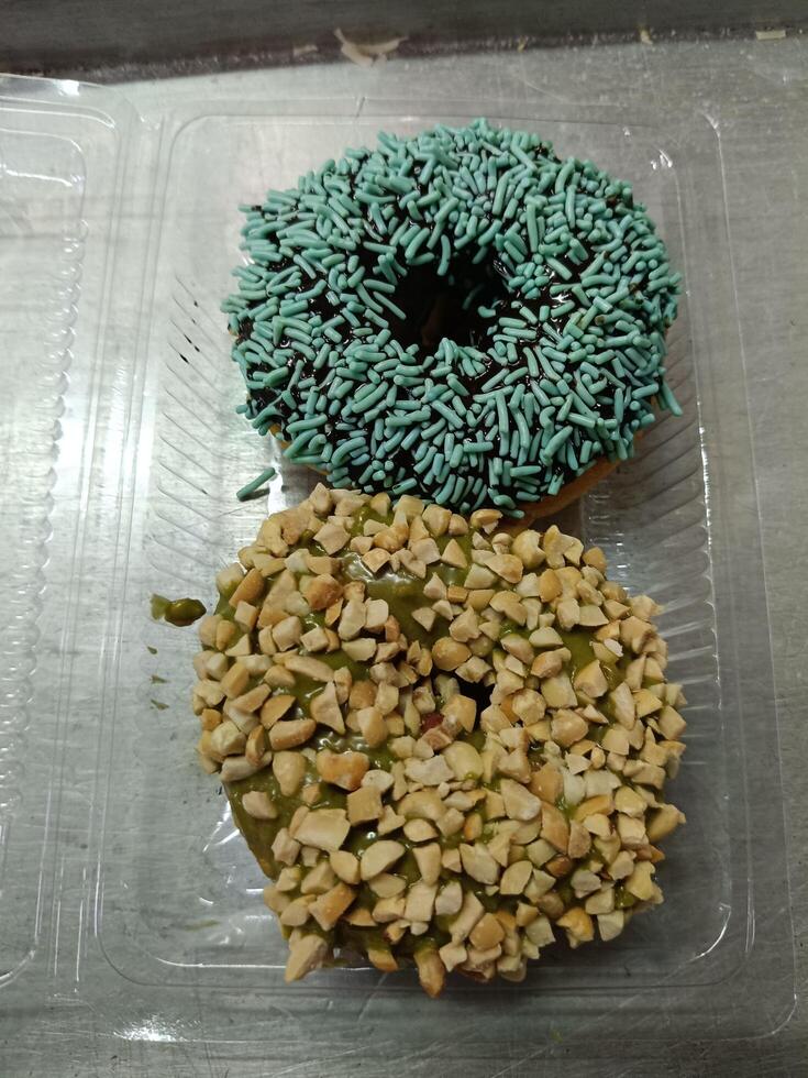View of two sweet donuts ready to eat photo