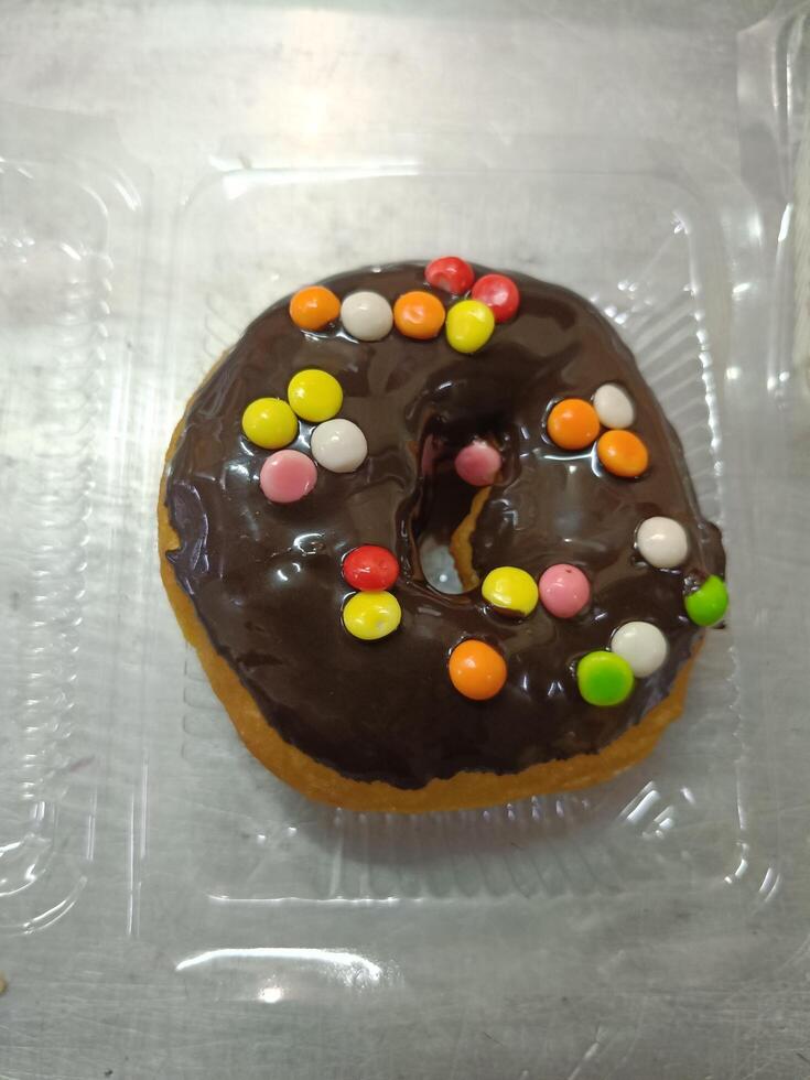 Colorful Chocho chips on the top of donuts photo