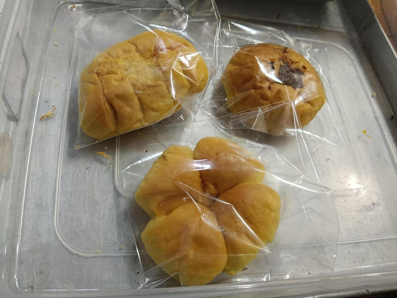 View of three different flavored breads that have been packed photo