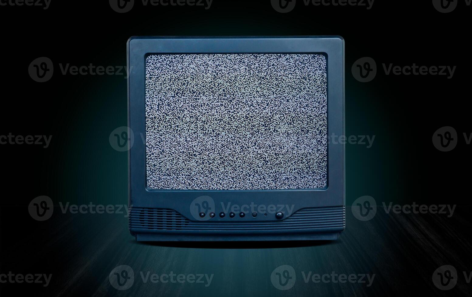 vintage old television receiver on table front gradient green wall background,vintage tv with cut screen on perspective wooden floor,blue glow and dark tone style photo