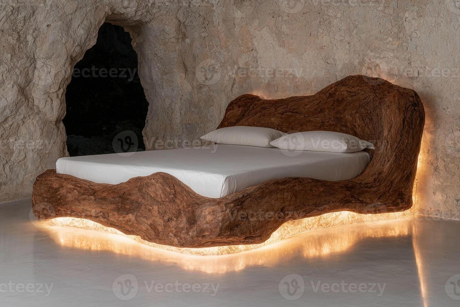 Luxury wooden bed with warm lighting in a cave setting photo