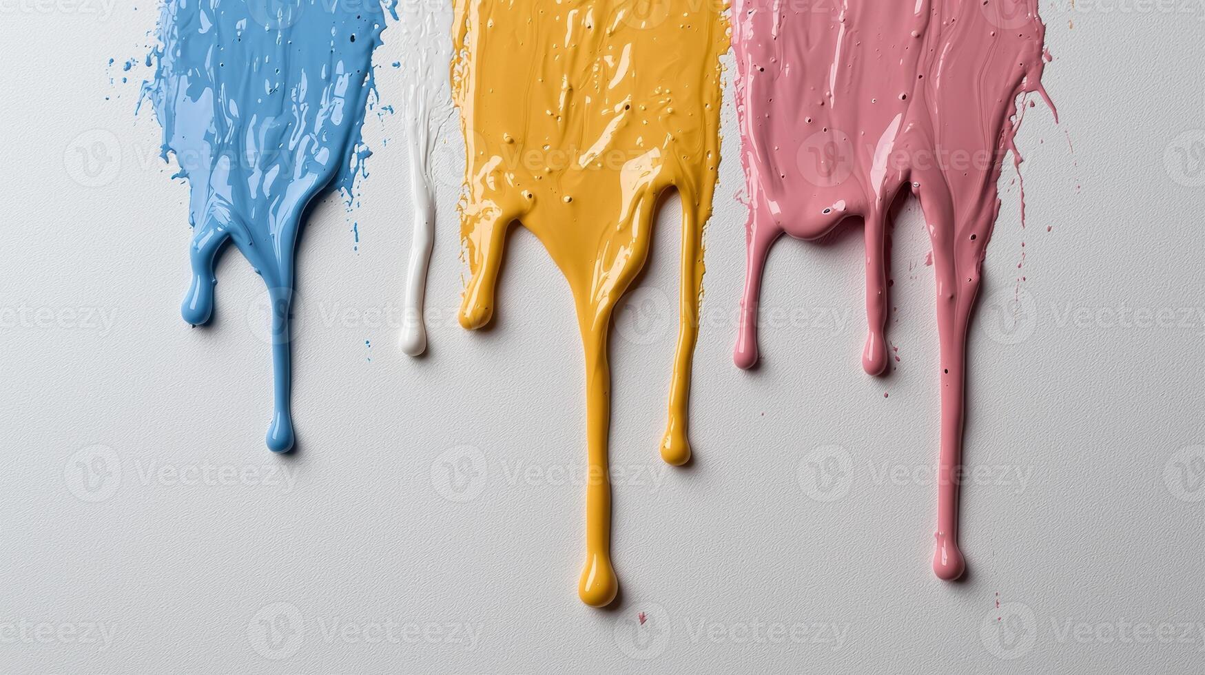 Abstract paint drips in blue, white, yellow and pink on white background photo