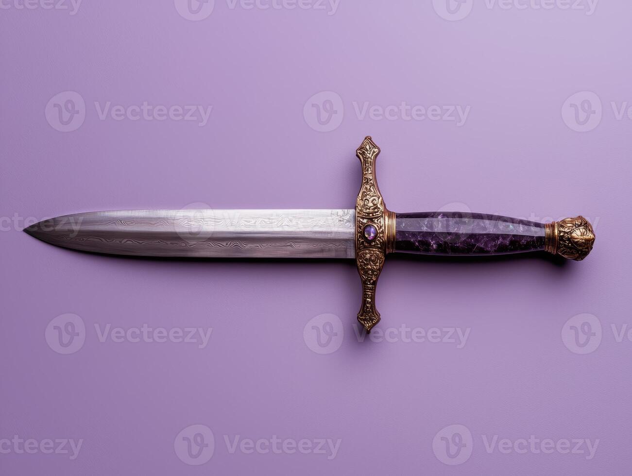 Ornate dagger with purple gemstone handle on purple background photo