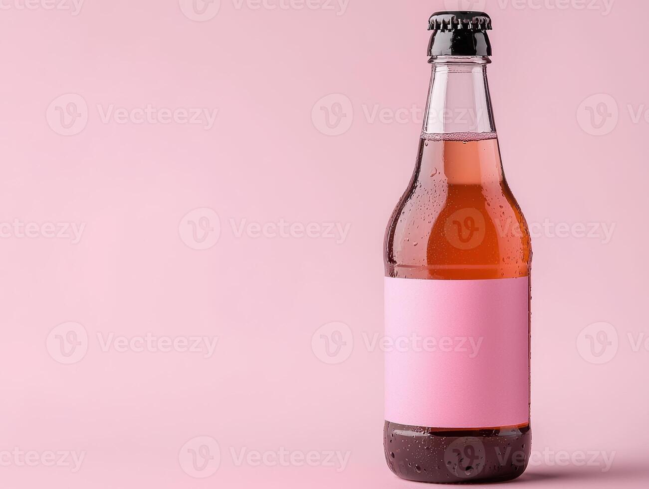 Pink beverage bottle mockup with blank label on pink background photo