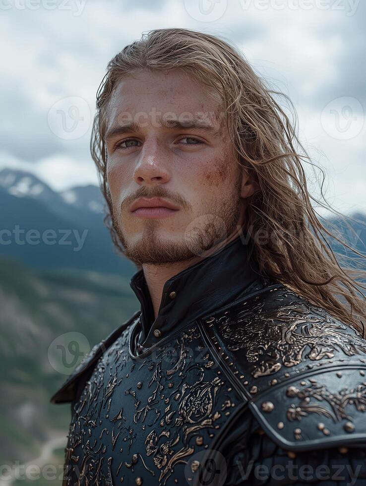 Portrait of a medieval warrior with long blond hair and battle worn armor photo