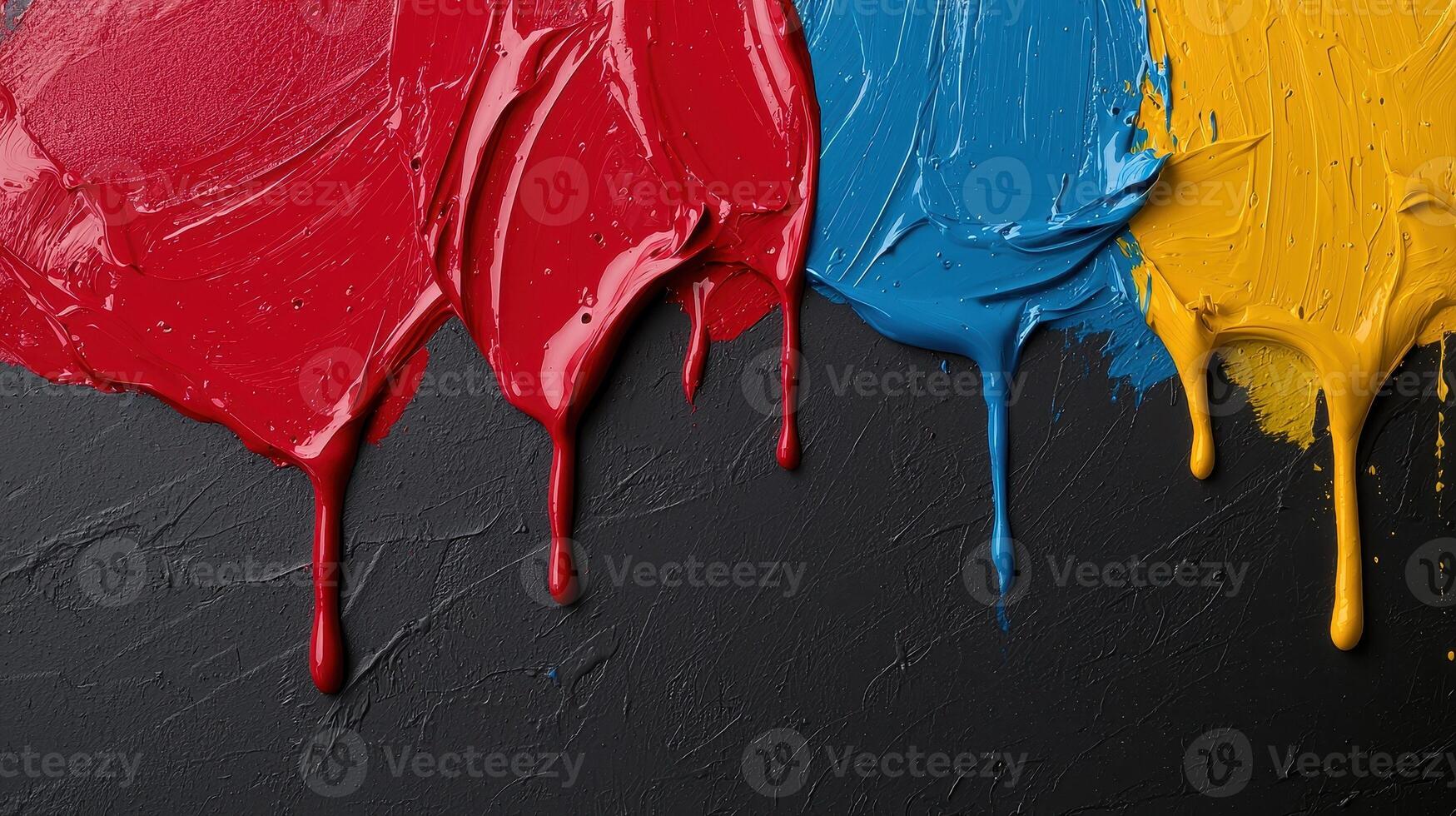 Abstract paint texture background with red, blue and yellow paint dripping down photo