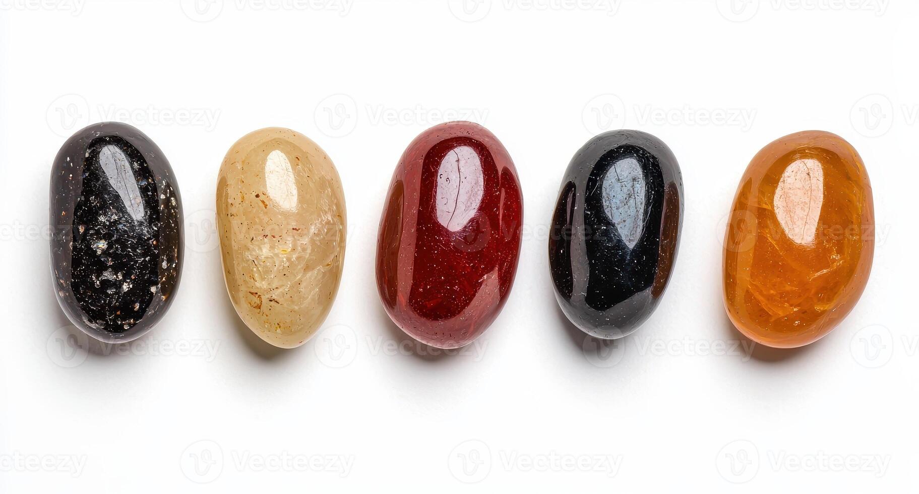 five different colored stones are arranged in a row photo