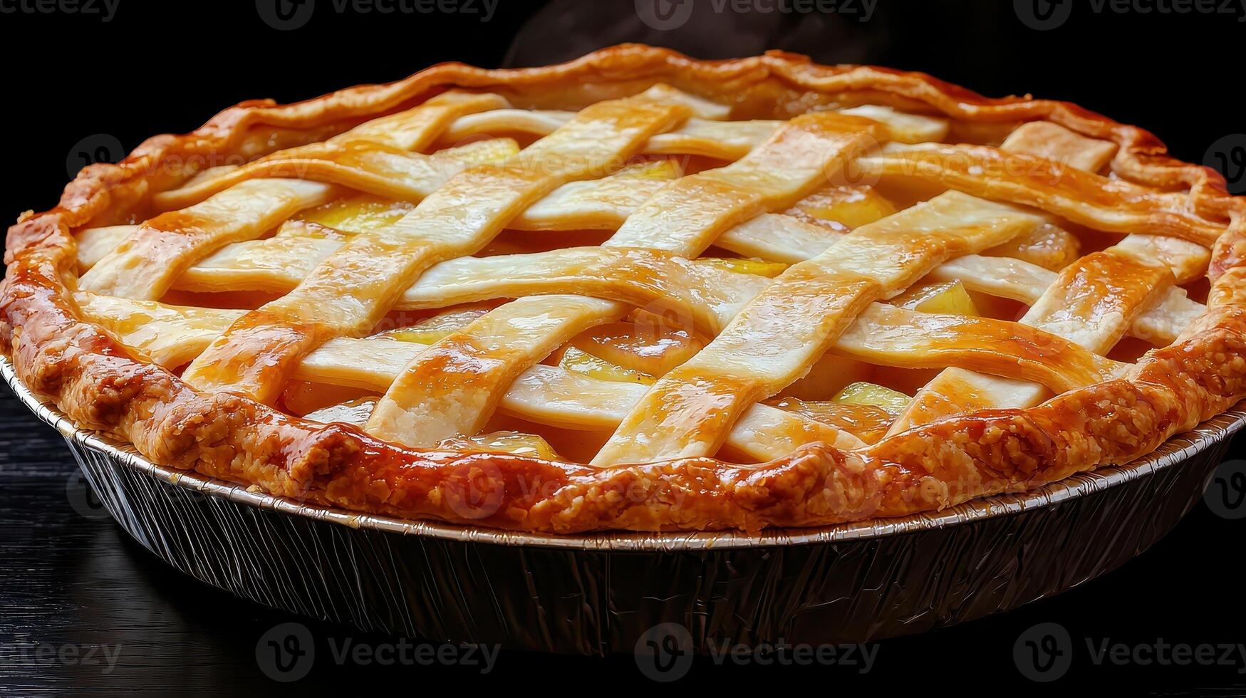 Delicious golden brown apple pie with a lattice crust photo