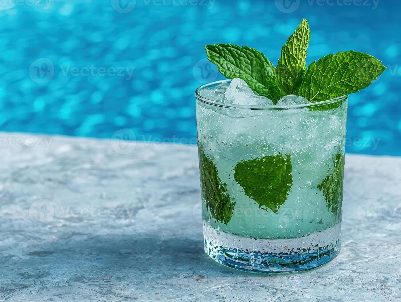 Refreshing mint julep cocktail by the pool photo
