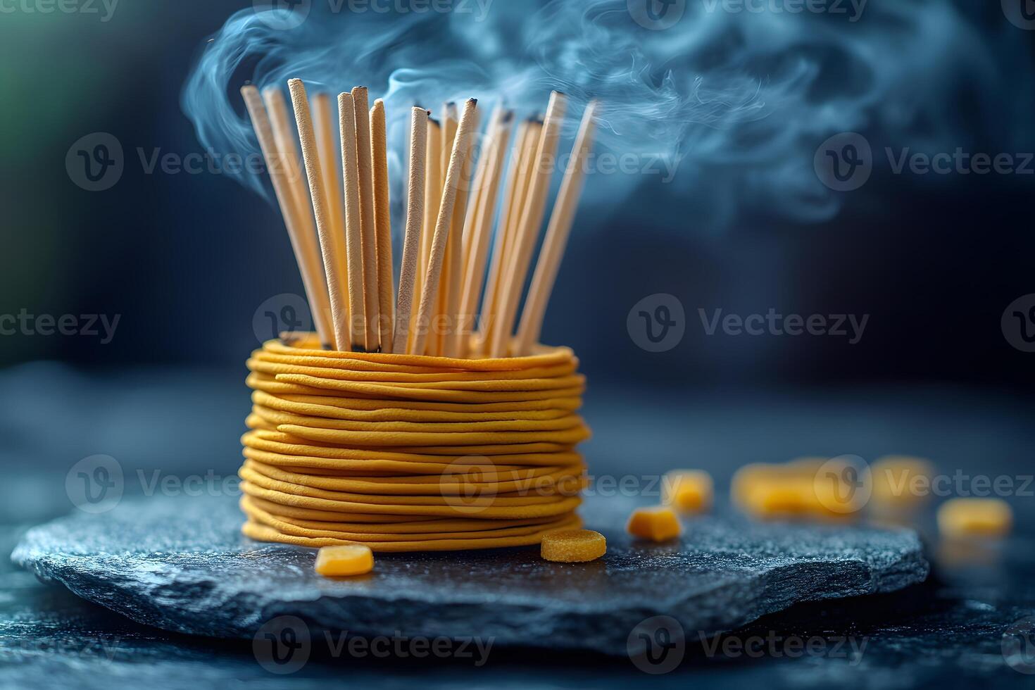 Artistic Arrangement of Smoking Incense and Noodles on Slate Surface for Zen Meditation photo