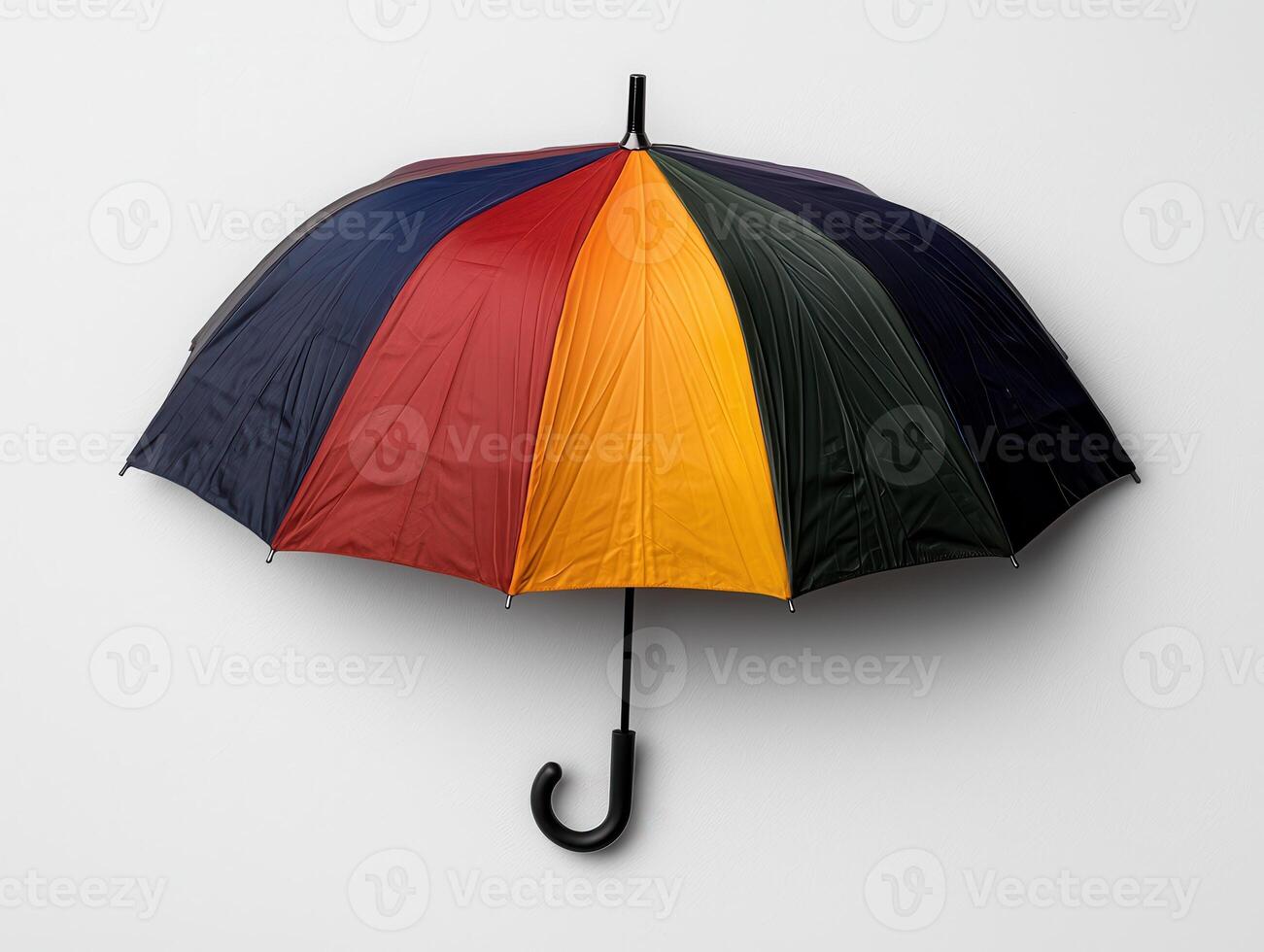Colorful rainbow umbrella hanging on a white wall photo