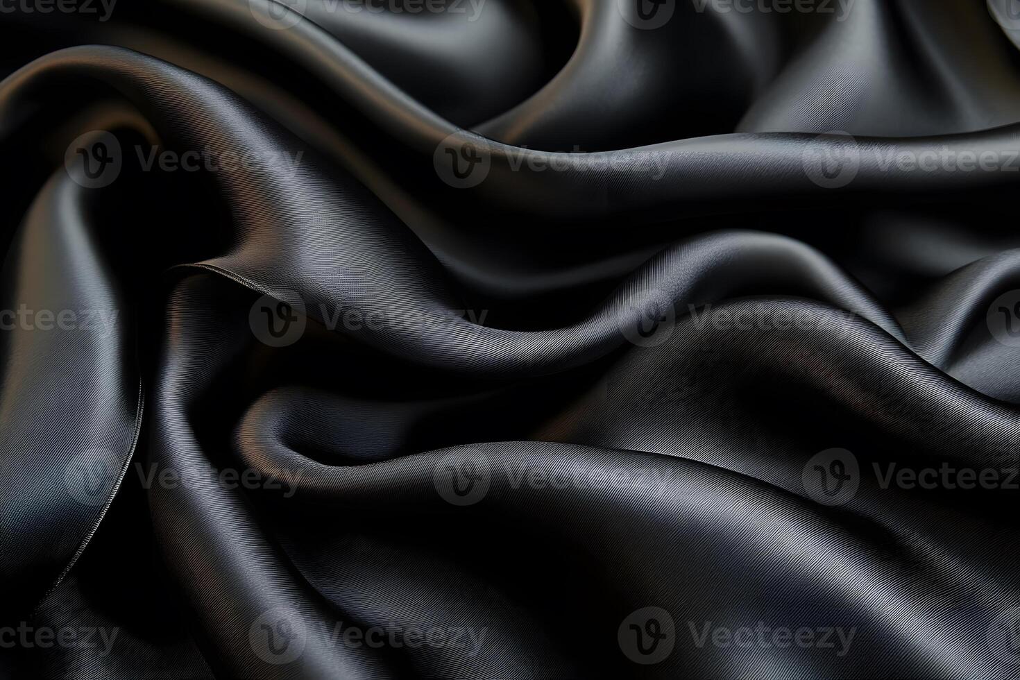 Luxurious Black Silk Fabric with Elegant Folds for Fashion and Design Projects photo
