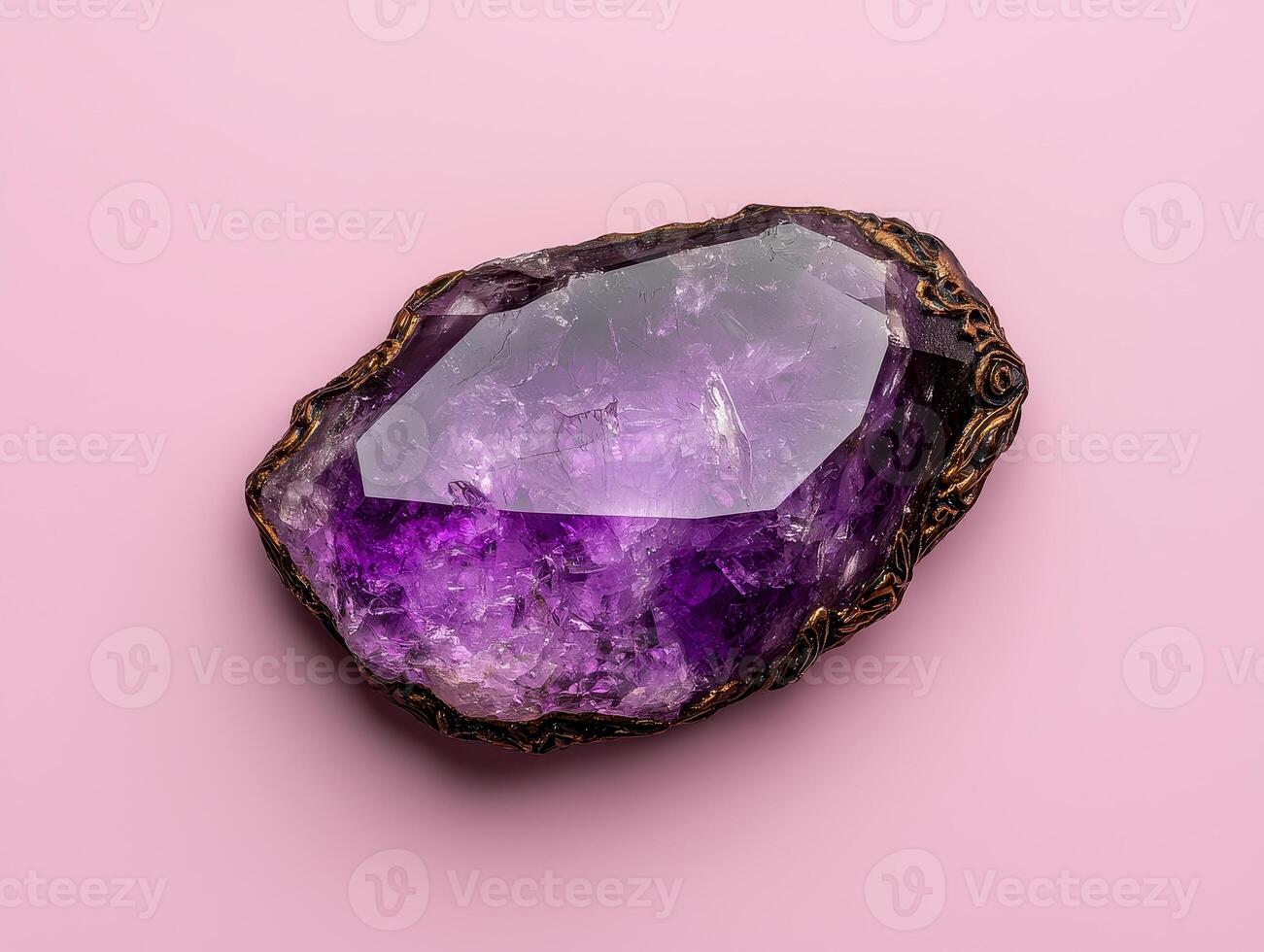 Amethyst Geode with Ornate Gold Frame on Pink Background photo